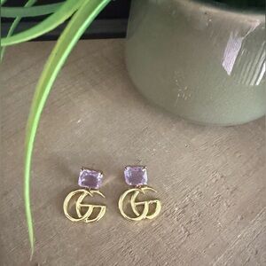 Gold Tone GG Drop Earrings with Lavender Crystal Studs